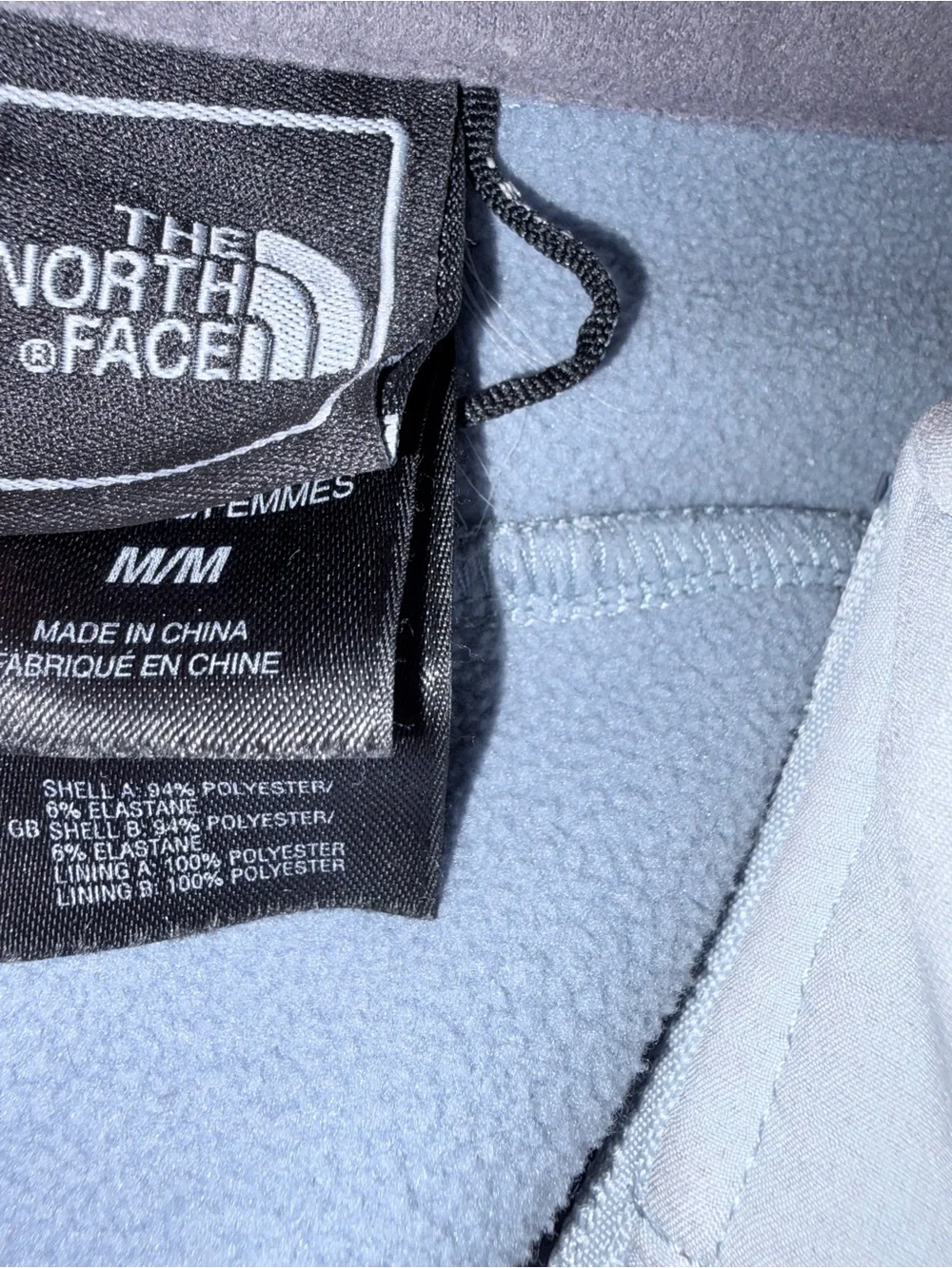 The North Face Women's White Softshell Jacket with Light Gray Fleece Lining